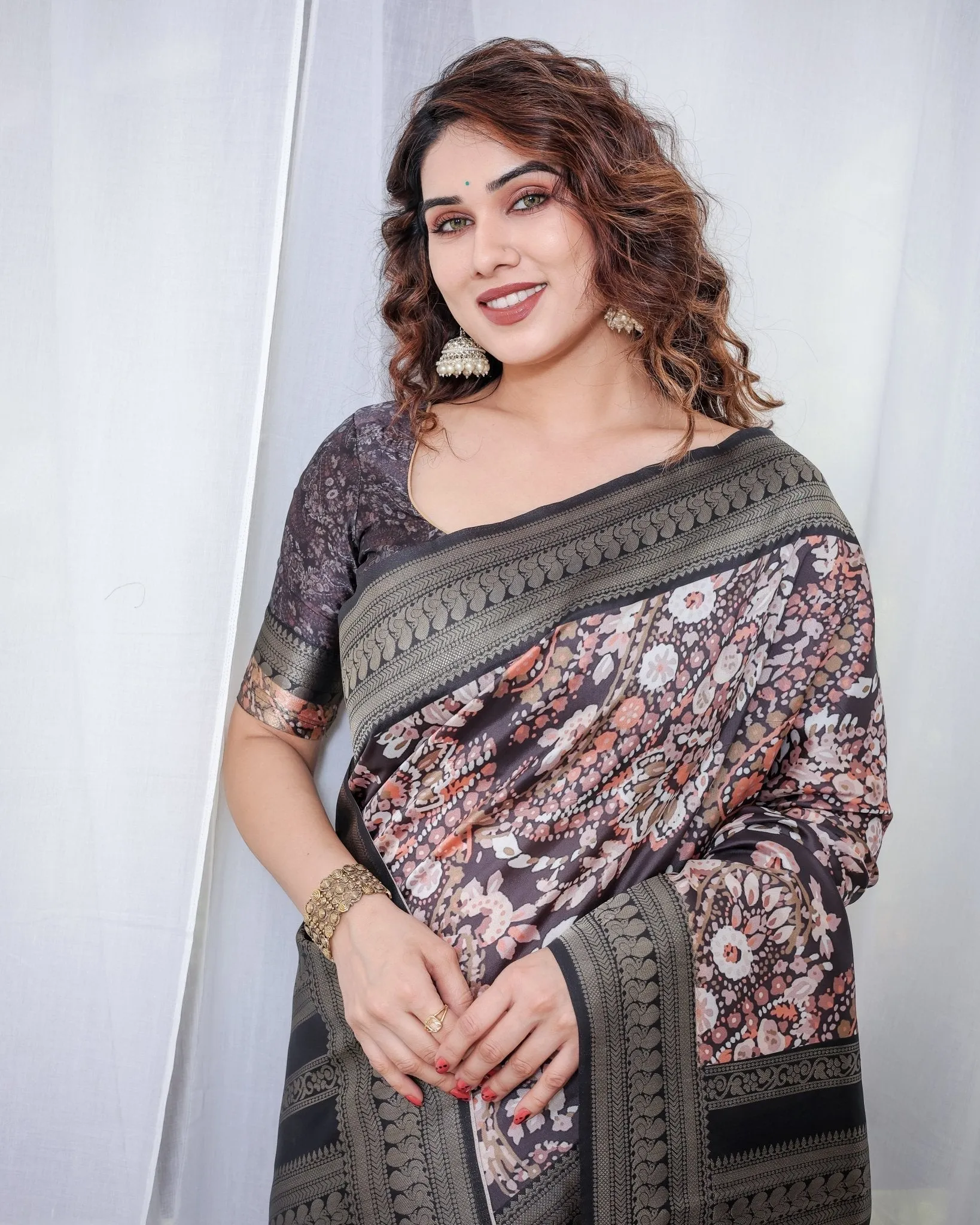 Exquisite Black and Pink Floral Banarasi Silk Saree with Intricate Tassels