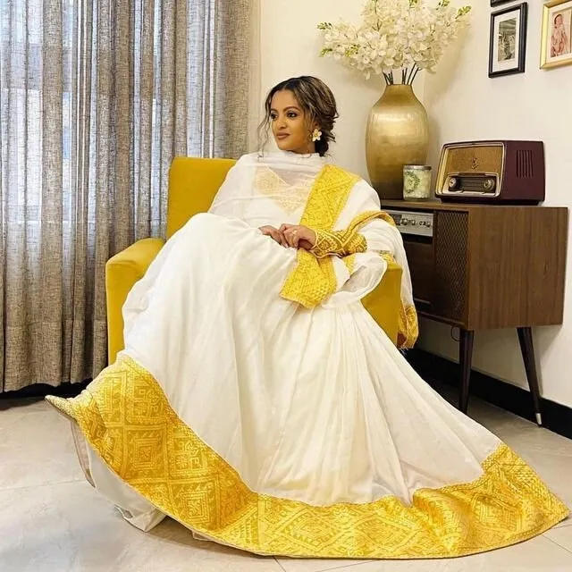 Yellow embroidery Ethiopian dress habesha dress design beautiful tilf habesha kemis