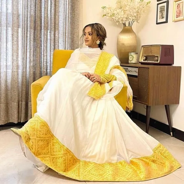 Yellow embroidery Ethiopian dress habesha dress design beautiful tilf habesha kemis